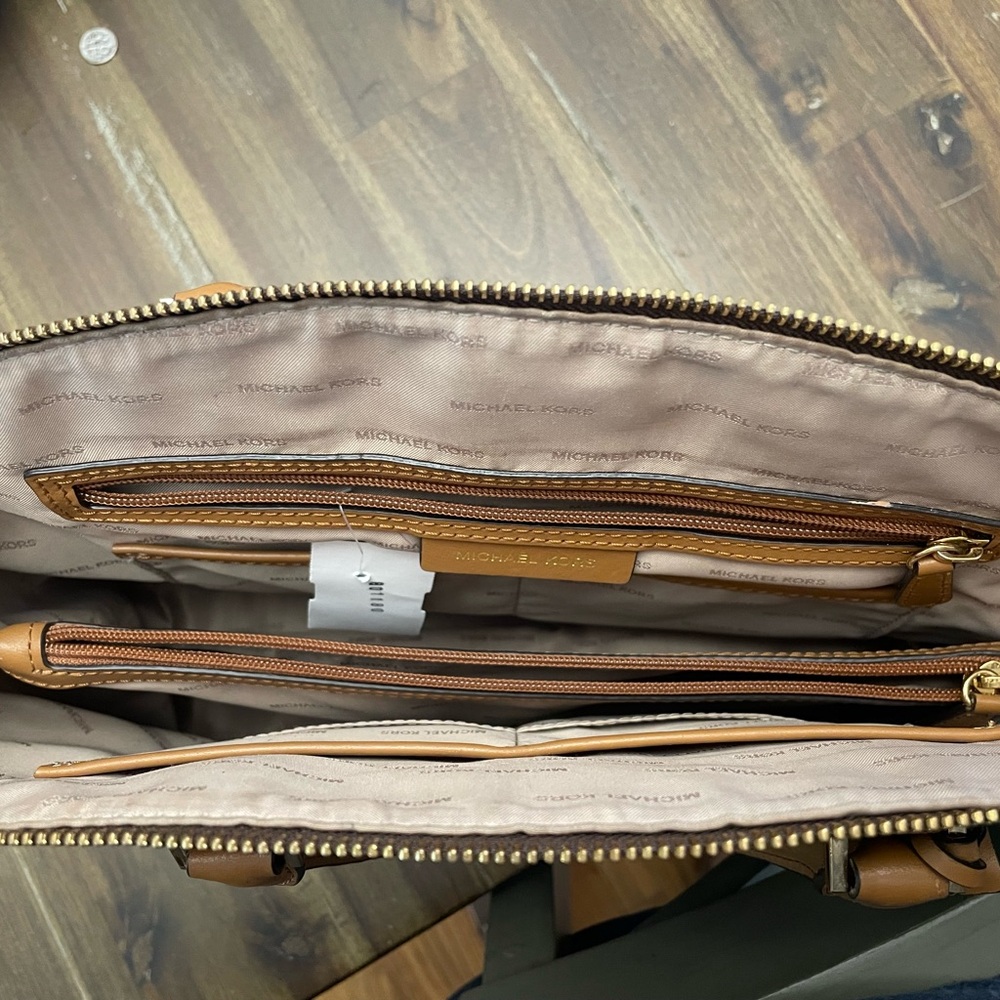 Brown leather Michael Kors handbag.